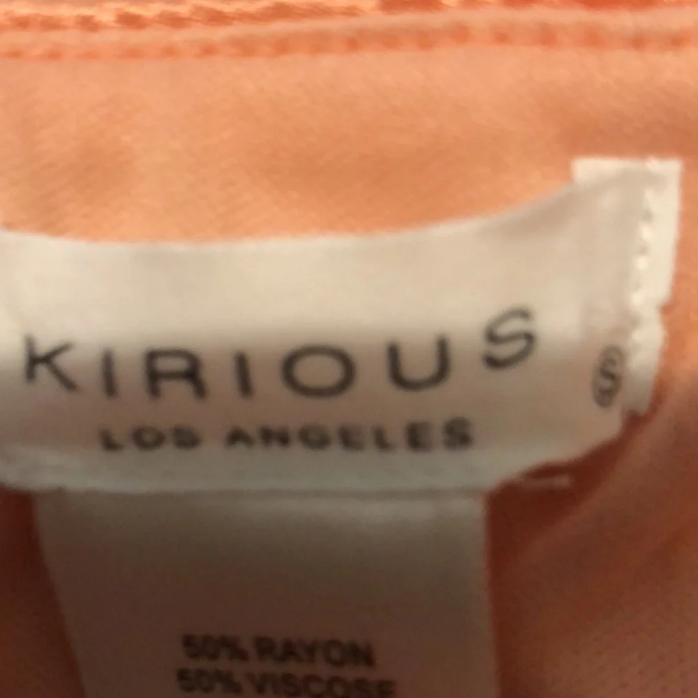 Peach Satin Mini Skirt with Soft Silky Feel Size S Price Firm